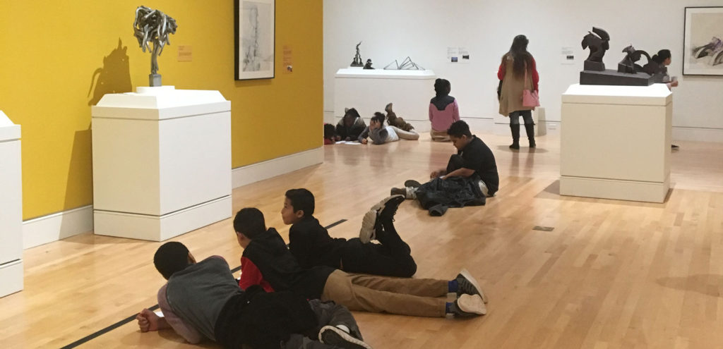 5th-graders touring the Richard Hunt exhibition