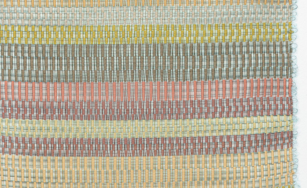 detail of Tali Weinberg's "Silt Study: South Atlantic Gulf Basin," a woven work of art based on 126 years of temperature data for one of the 18 major river basis in the continental US, plant-derived fibers and dyes, petrochemical-derived fishing line