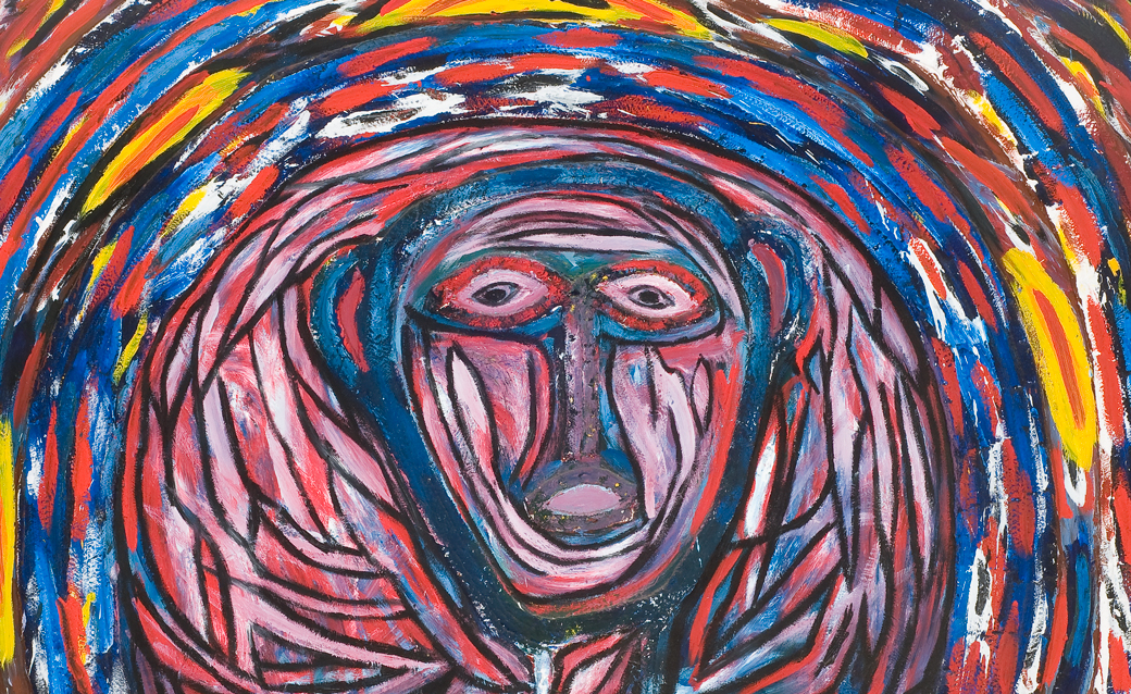 detail of Thornton Dial's "Grand Central Station," a large multimedia painting of a man's face surrounded by bands of color