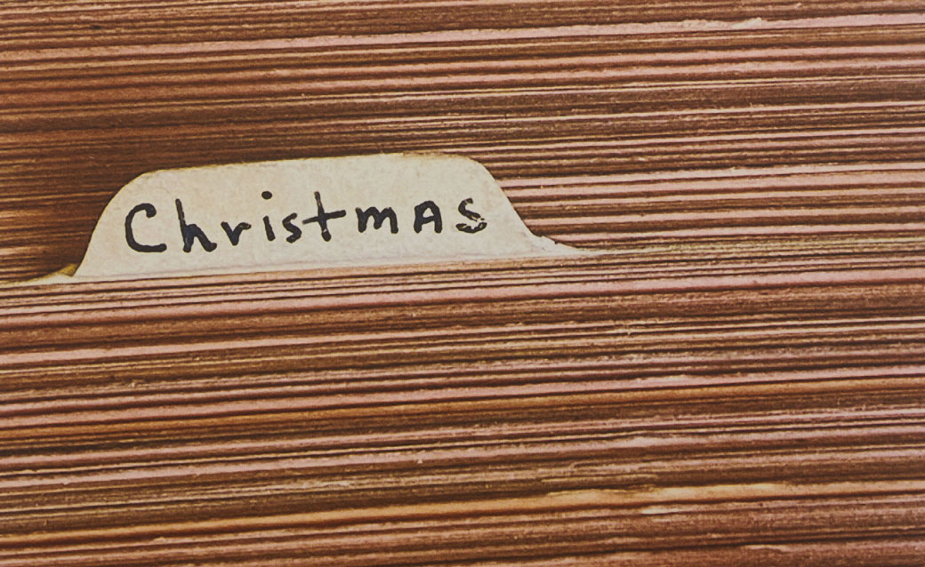 detail of a Richard Prince inkjet based on Milton Berle's joke file; it shows a close-up of index cards with a divider labeled "Christmas"