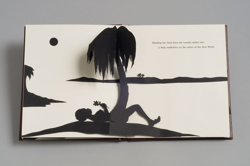 a pop-up book made by the artist Kara Walker that shows silhouetted figures