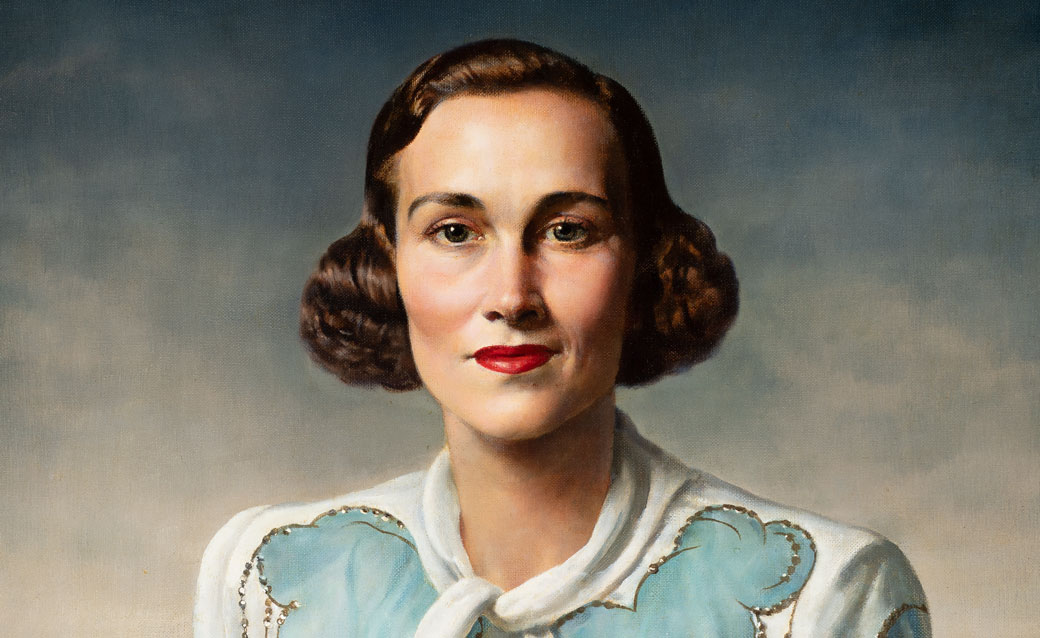 a detail of Gerald Brockhurst's portrait of a woman wearing a white dress with splashes of aqua and gold accents. Her bobbed hair is dark brown and her lips are very red. She stares steadily at the viewer.